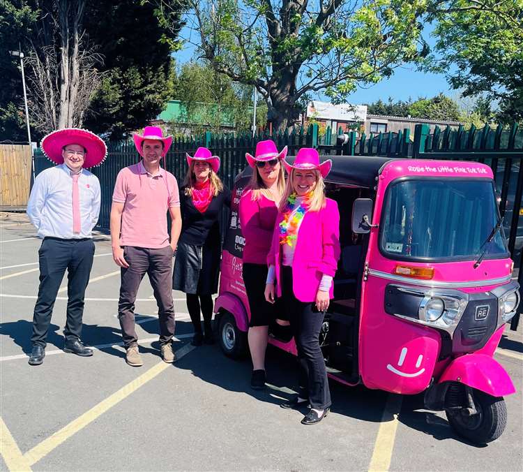 Pink tuk tuk and Rosie May Foundation team during Rosie May Day charity event