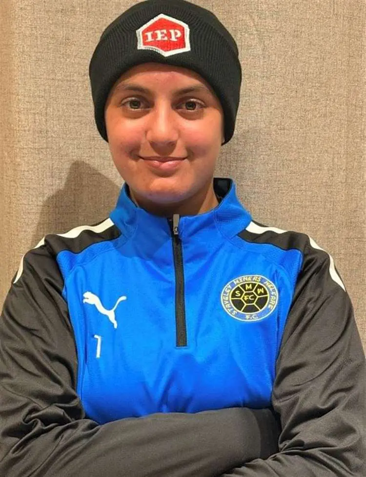Olivia Valentine, a young goalkeeper sponsored by International Export Packers, in football kit preparing for her move to the USA to play college soccer.