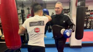 Jade Grierson making her professional boxing debut against two-time world champion Terri Harper at Stefy Bull’s New Beginnings show, held at the Legacy Conference Centre in Doncaster. The crowd watches in anticipation as the two athletes put on a thrilling performance.