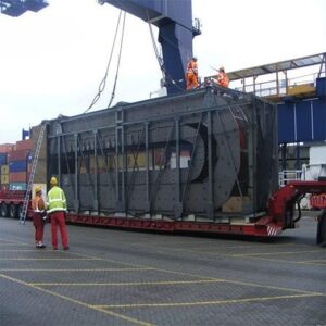 Drag-chain built in IEP's yard, secured with a net and strapped to a low-loader, ready for shipment aboard the MSC Renée.