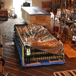 Three sets of gas pipes weighing 40 tonnes securely packed on a 12×6 railed base, blocked out and sealed in a protective foil bag for safe transit.